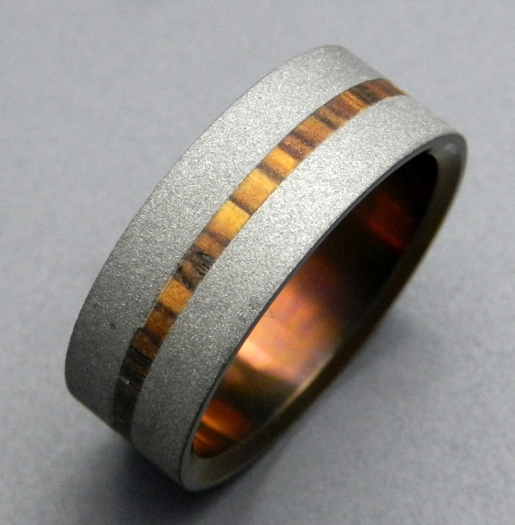Strong Heart | Men's Cocobolo Wood & Anodized Titanium Wedding Ring - Minter and Richter Designs