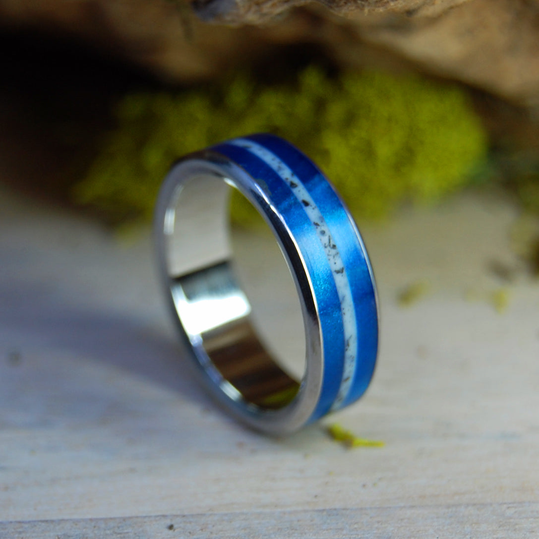T-REX ON CAPE COD | Cape Cod Beach Sand with T-Rex teeth Between Blue Marbled Resin - Titanium Wedding Ring - Minter and Richter Designs