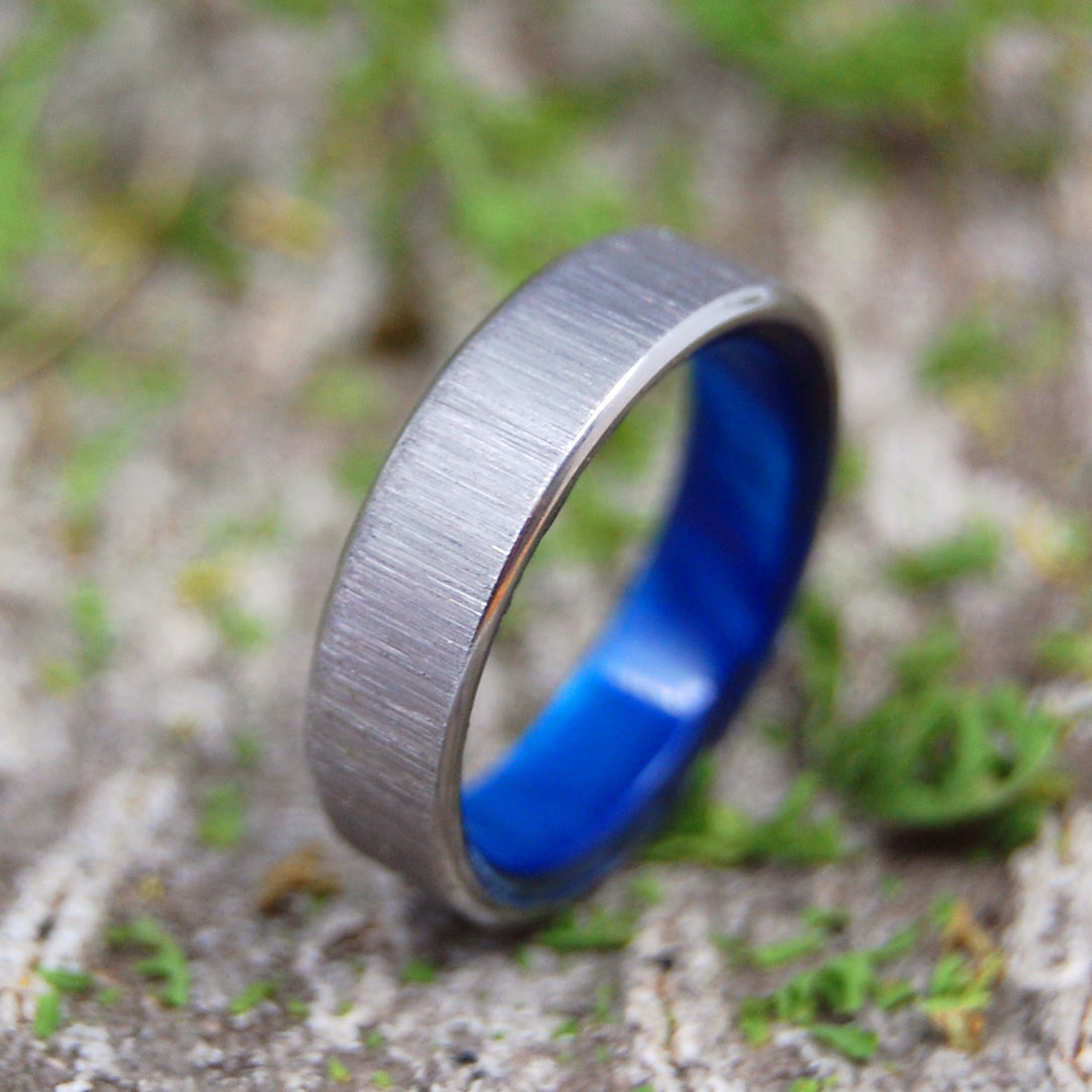 PRINCESS WITH A LEFT JAB | Handcrafted Blue Resin & Titanium Wedding Rings - Minter and Richter Designs